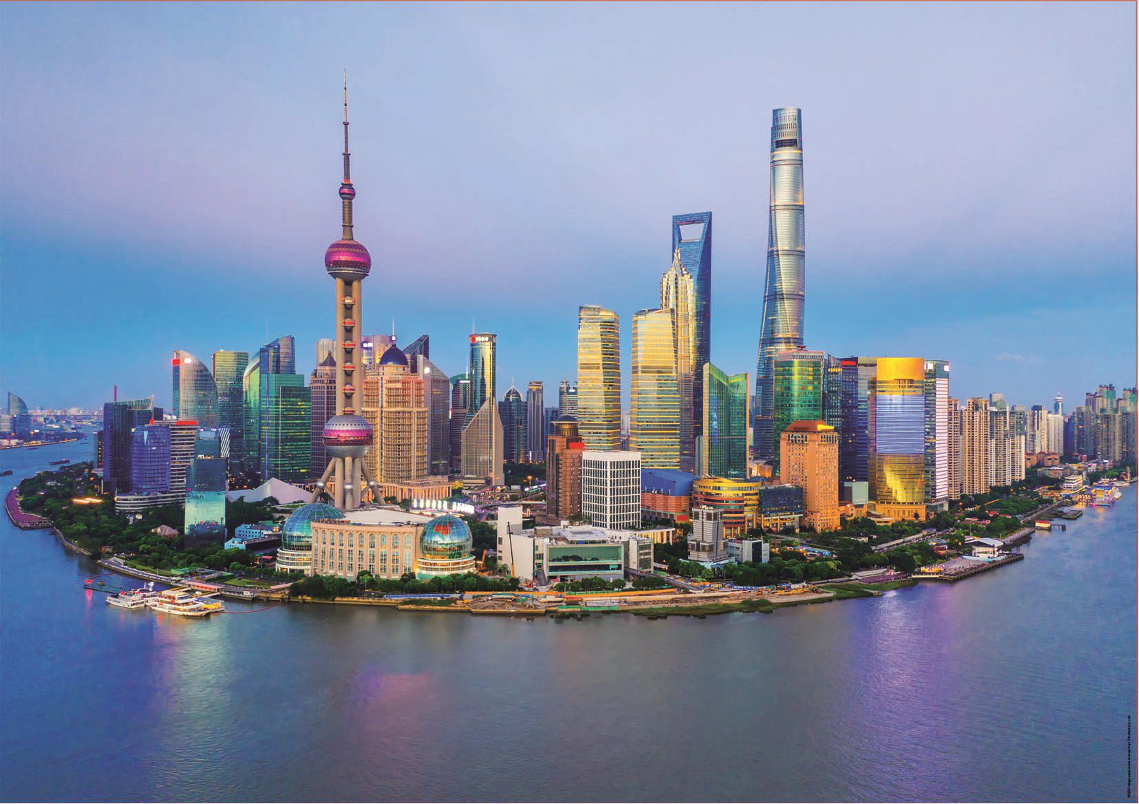 Puzzle Skyline van Shanghai bij zonsondergang