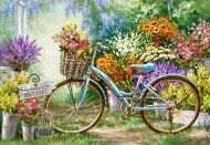 Puzzle Kék bicikli a virágok között 